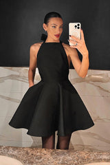 Black high-waisted sleeveless halterneck dress