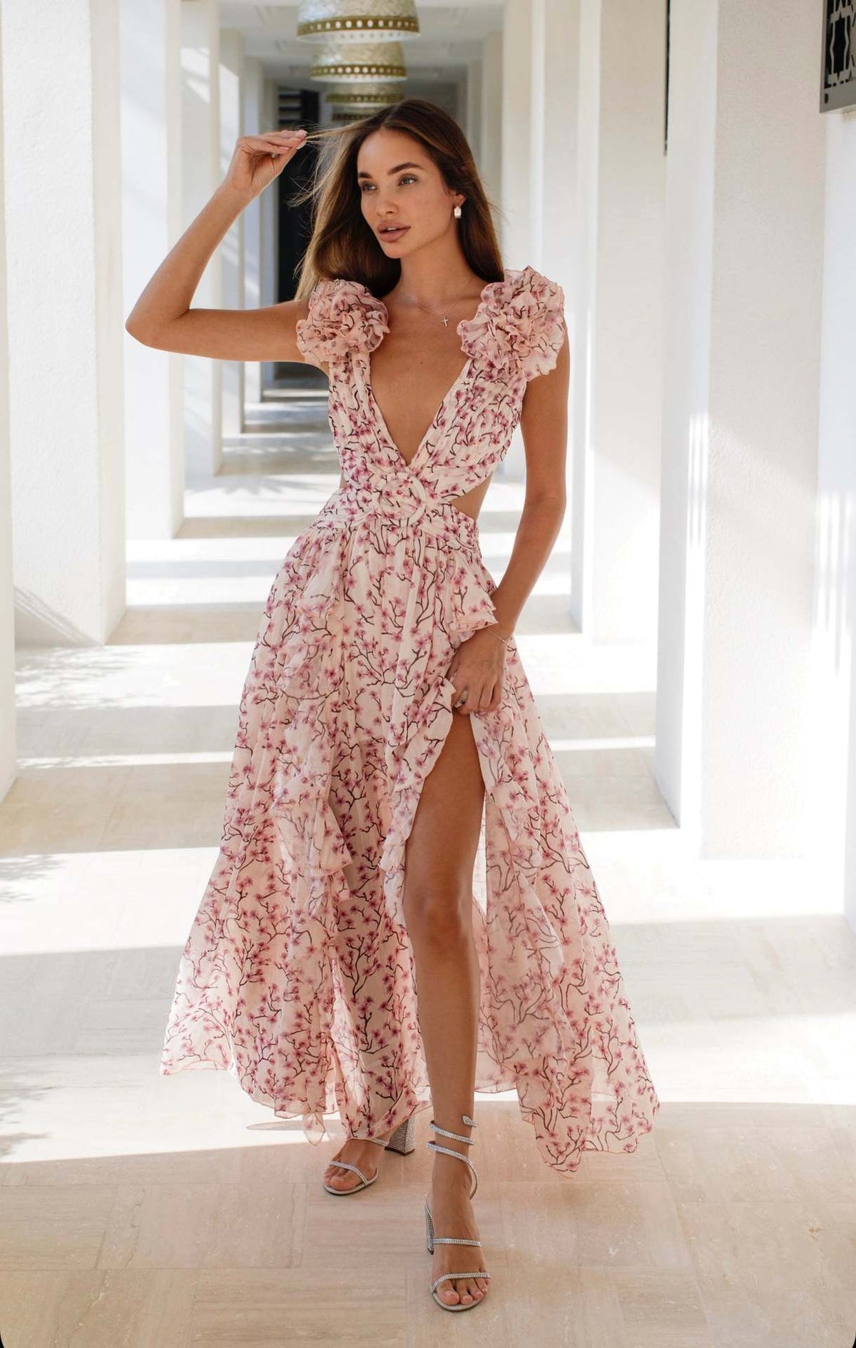Resort style hollow slim fit deep V ruffled floral backless dress
