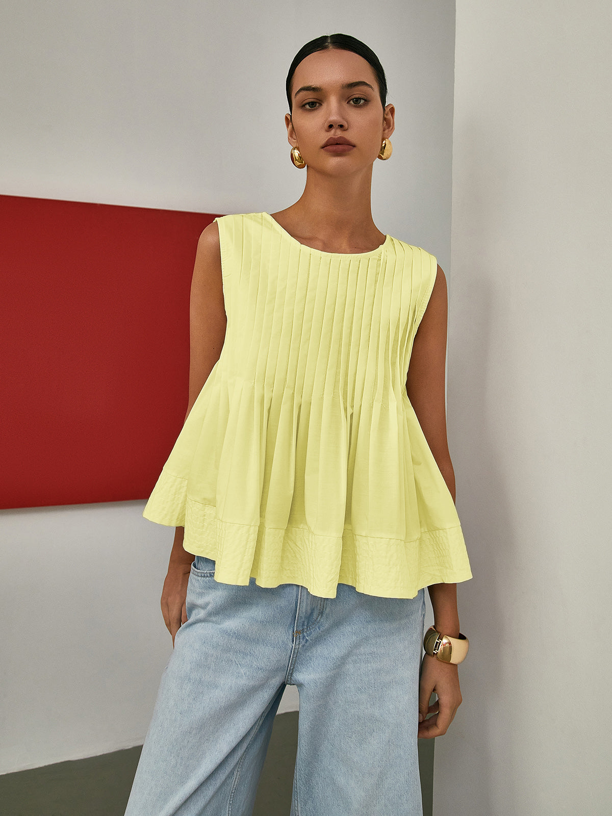 Pleated Peplum Sleeveless Blouse