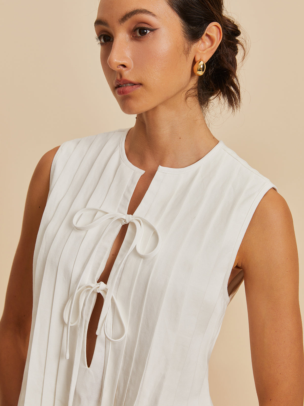 Pleated Knotted Sleeveless Blouse