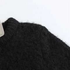 Avant-Garde Knitted Top with Bow Decoration