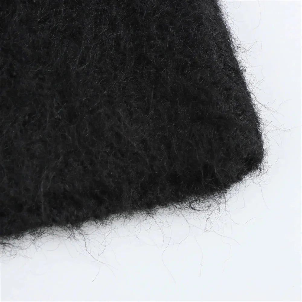 Avant-Garde Knitted Top with Bow Decoration